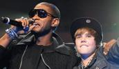 Usher and Justin Bieber perform onstage in New York in December 2009