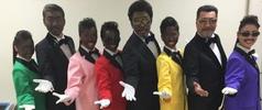 Momoiro Clover Z and doo-wop group Rats & Star in blackface makeup and minstrel-style costumes 