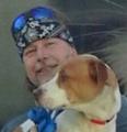 Jeff Frojd, the uncle of New Orleans murder victim Julia Anderson, stands with Anderson's dog, "Momma,"