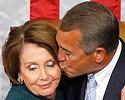 U.S. House Speaker John Boehner kisses House Minority Leader Nancy Pelosi