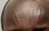 Garang Ayang - tribal scars