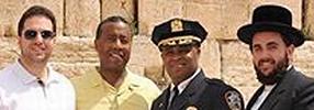 Then-NYPD Chief of Department Philip Banks (in uniform even though it was a personal trip) visits the Western Wall in October 2014 with Manhattan real estate powerhouse Jona Rechnitz (in white shirt), who covered Banks’ hotel bill, and prominent Borough Park figure Jeremy Reichberg (right).