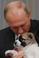 Putin kisses puppy
