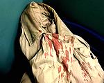 victim's bloody coat