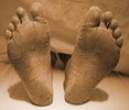 Black man's feet in morgue